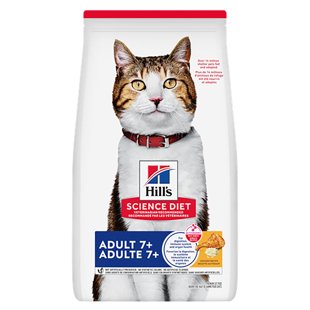 A bag of Hill's Science Diet Adult 7+ cat food, featuring a large photo of a white and brown tabby cat wearing a red collar on the front of the packaging.